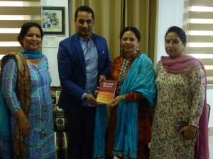 Jasvinder presenting the book